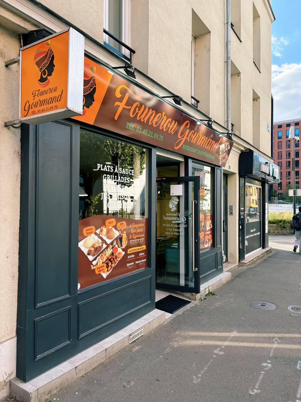 Façade orange du restaurant africain Founerou Gourmand au 63 rue Molière à Ivry-sur-Seine